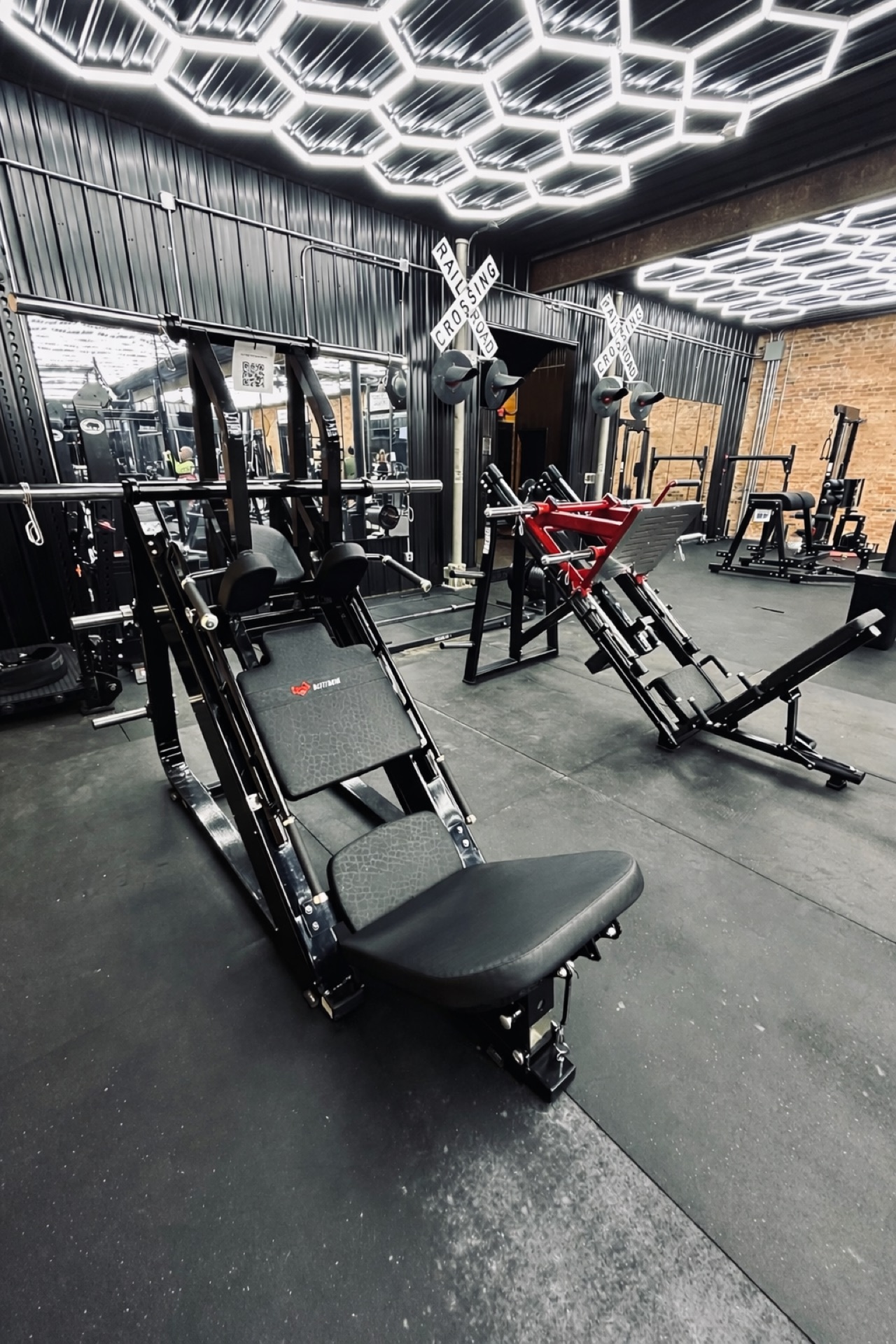Off The Tracks Gym equipment with hexagonal lighting
